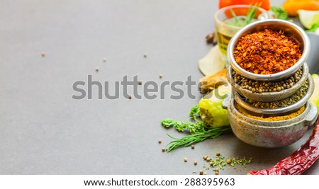 Spices and herbs in metal bowls background for decorate and design project.