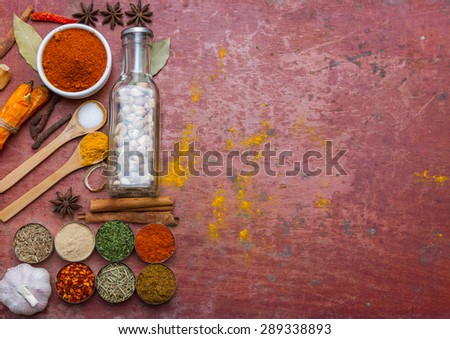Mixed spices and herbs.Food and cuisine ingredients red background for decorate design.