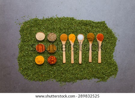 Mixed spices and herbs on black background for decorate and design.