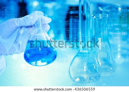 scientist with equipment and science experiments ,Laboratory glassware containing chemical liquid, science research,science background and science concept.