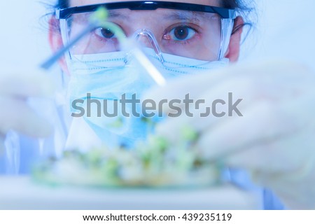scientists working at the laboratory,scientist leaning against the whiteboard in laboratory,scientist background,female scientist looking in laboratory,scientists studying and selective focus.