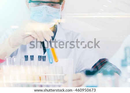 (SCIENCE) Scientist is certain activities on experimental science like mixing chemicals, microscope, entry data to develop science medicine or food for everyone on the world, Film effect.