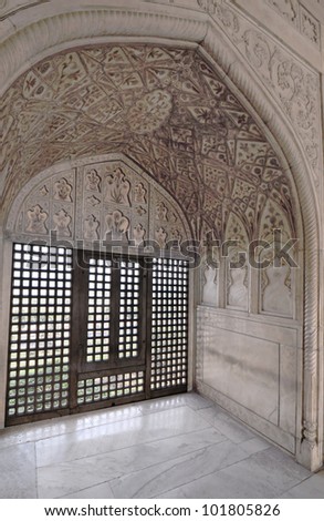 Arches, marble and screen window in the Emperor\'s apartment Agra Fort, India