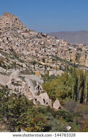 The fortress Urchisar Castle in Cappadocia located on the highest point in the region. Houses are built into the hillside. A major attraction the citadel is the largest and tallest fairy chimney.