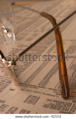 glass on news paper