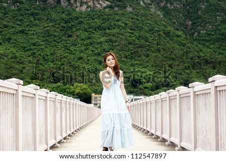 Girl in natural scenes, green trees background in hong kong on Lantau island, Tai O