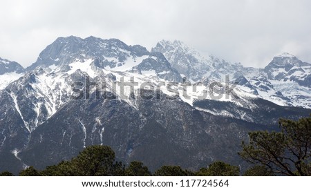 beautiful snow mountain landscape which named Mount Yulong or Mount Jade Dragon in Yunnan province, Lijiang countryside