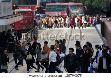 HONG KONG - JANUARY 14: the crowd in Causeway Bay on 14 January  2012. Hong Kong is one of the most densely populated areas in the world with an overall density of some 6,300 people per square km.