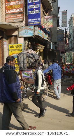 KATHMANDU, NEPAL - JANUARY 19: the rickshaws is one of important vehicle in kathmandu on 19 Jan 2010. the United Nations list Nepal as one of the Least developed country in the world