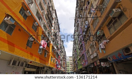HONG KONG - JULY 14: old resident dense building in To Kwa Wan district on July 14 2012.Hong Kong is one of the most densely populated cities in the world, which make the house design is squeezing