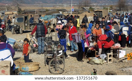 SHANGRI-LA, CHINA - FEBRUARY 16:the native trade in the rural market in western Yunnan on Feb 16 2012. Even china economic growth is rising, western china is still undeveloped.