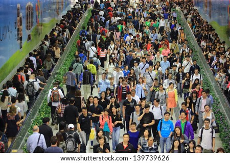 Hong Kong -May 13: The Crowd Of People In Tunnel Of Central Mtr Subway Station On May 13 2013. 6 P.M. Is The Peak Of Rushing Hour In Central Because All People Come Off Work