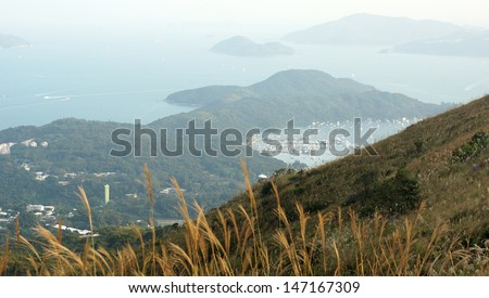 the meadow front bird view with the Inland Sea background in Sai Kung suburb from Mount Ma On Shan in Hong Kong