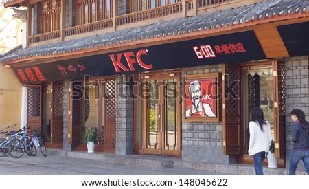 LIJIANG, CHINA -APIRL 7: The KFC restaurant with chinese architectural style in Lijiang old town on april 7 2012. the KFC become the local famous restaurant after the development of chinese economics.