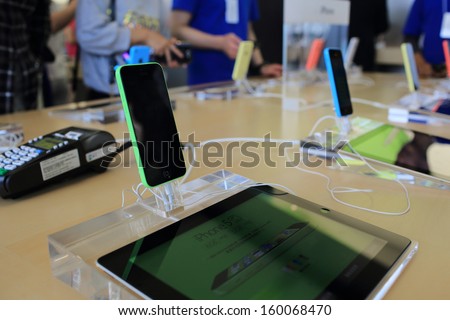 Hong Kong - Oct 25: New Iphone 5 C Display In Apple Store In Hongkong On October 25, 2013 . Apple\'S Reportedly Cutting Production Of Its Low-Cost Iphone 5c, But Raising Production For Iphone 5s