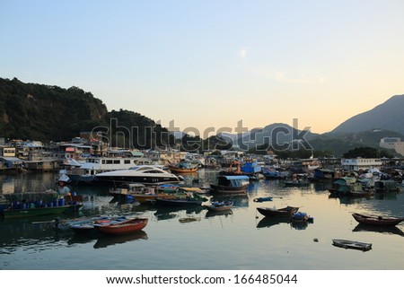 HONG KONG,  NOVEMBER 30:  the fishing boats park in Lei Yuen Mun on 30 nov 2013. Lei Yue Mon was a fishing village before but now it become the seafood village