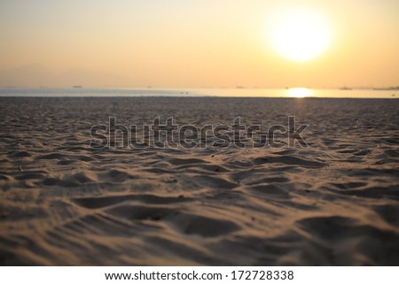the nobody sand background far far away from sea , under sunset