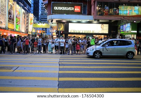 Hong Kong, August 26: The Pedestrians Waiting At Mongkok In Hong Kong On 26 August 2013.Hk Government Call Off The Pedestrian Zone In Mong Kok Because Complains For The Crowded People