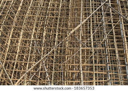 thousands of bamboo which is the Scaffolding project in office building construction site in hong kong downtown