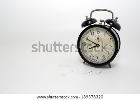 old broken clock with the white background, noises clock is hated when you don\'t want to wake up