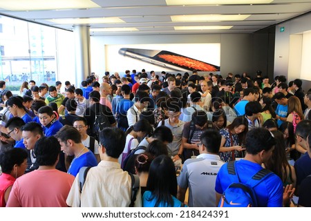 HONG KONG, SEPT. 20: New launch of Apple iPhone six plus are surround by people in Central IFC apple store on 20 September 2014. Hong kong is one of region where the iPhone 6 1st round launching.