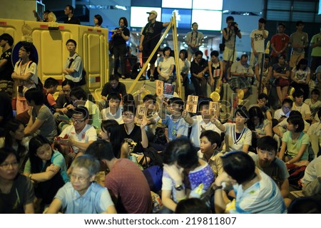 HONG KONG, SEPT 26: crowds are support the protest out of Government Offices in Tamarind on 26 September.2014. Students involved in protest for 2017 Chief Executive Election and education issue