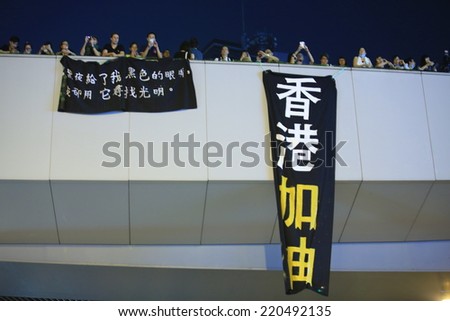HONG KONG, SEPT.29: Crowd of protesters show the banner \