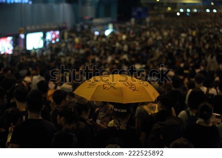 HONG KONG, SEPT.29: protesters with umbrella in Admiralty on 29 September 2014. umbrella become the sign of against tear shell after riot police fire tear shell to the peaceful protesters on 28 sept
