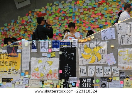 HONG KONG,OCT. 13:people is still insist on ocuppy protest  in Admiralty on 13 october 2014. People involved the Umbrella revolution after two week, they leave comment and the symbol yellow umbrella