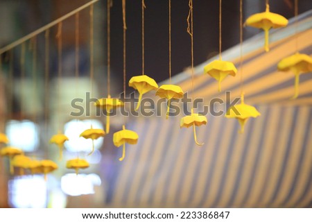 HONG KONG,OCT. 12:people hang the yellow umbrella, symbol of revolution in ocuppy protest  in Mong Kok on 12 october 2014.  Umbrella revolution two week ago, people is still insist on it