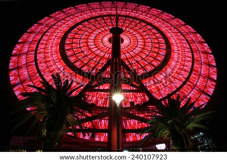ferris wheel change color at night in japan