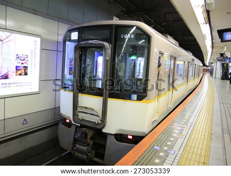 OSAKA,JAPAN; OCT 21:midosuji line train, by Municipal Subway, arrive the station of Namba in osaka on 21 october 2014. The Mid?suji Line is the main and busiest line in the whole subway network