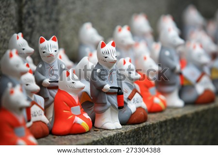japan culture: fox god toy sculpture with color printing