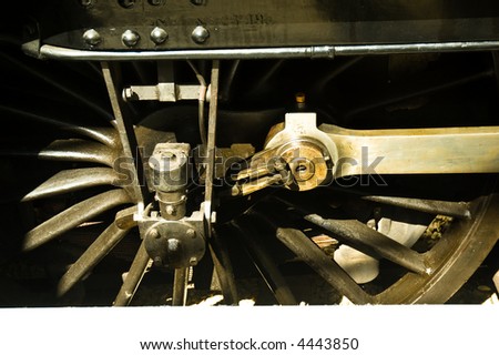 Close up of a steam train engine wheel