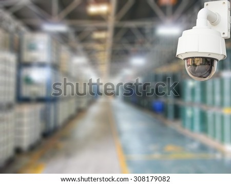 CCTV system security products chemical in warehouse of factory blur background.