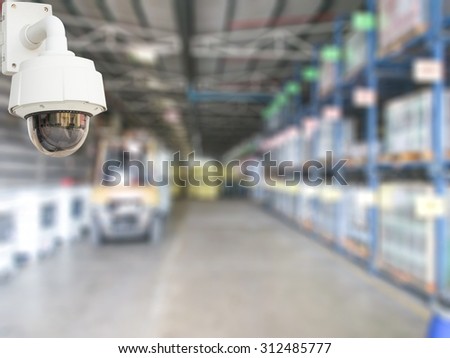 CCTV system security for products chemical in warehouse of factory blur background.
