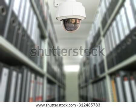 CCTV system security in document store room blur background.