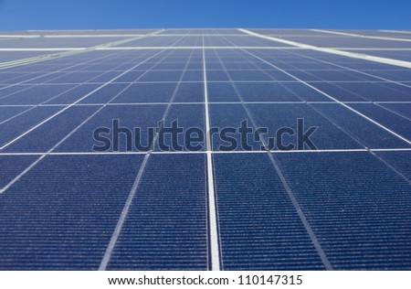 Solar panel close up against a blue sky