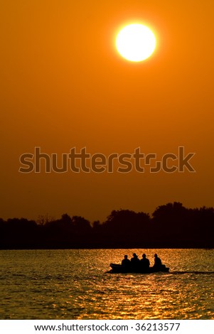 Fishermen Boat Silhouette at sunrise