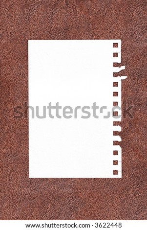 note page on brown leather background