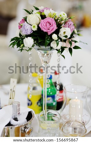 Decorative flowers standing on a table at a party