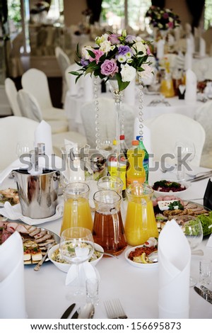 Decorative flowers standing on a table at a party
