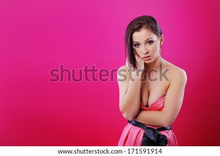 Fashion model in a pink dress