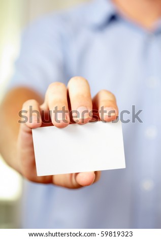 Man holding visiting card