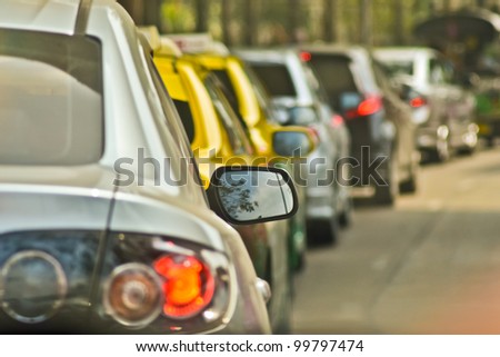 BANGKOK, THAILAND - A long queue of cars stuck in a traffic jam during peak rush hour