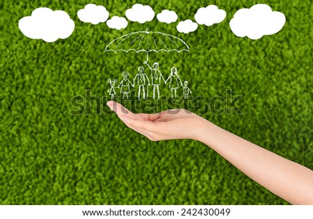 Woman open hand making a protection gesture  isolated on green background. Family life insurance, protecting family, family concepts.