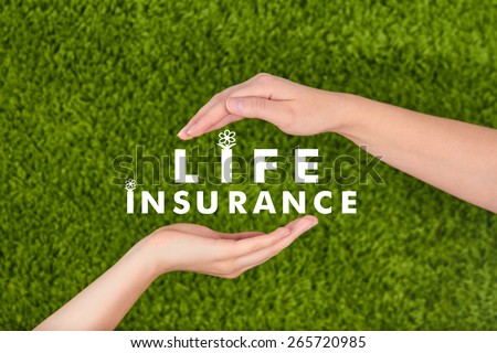 Two Woman\'s open hands making a protection gesture with  Life Insurance inscription  isolated on green background.Family life insurance, protecting family, family concepts.