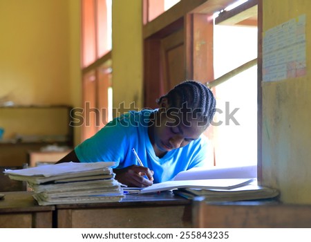 AMBRYM,VANUATU-OCTOBER 11, 2014: Young student preparing exams in school community on October 11, in Harimal-Vanuatu.