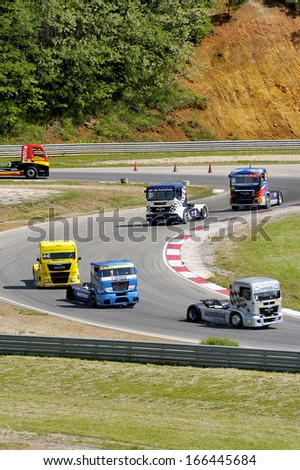 ALES, FRANCE - MAY 25: Grand Prix trucks on the circuit mechanical pole. Trucks follow in the first turns, may 25, 2013