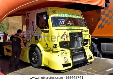 ALES, FRANCE - MAY 25: Grand Prix trucks on the circuit mechanical pole. Olivier truck parked in its booth, may 25, 2013